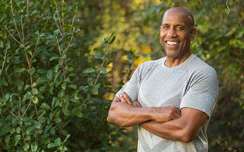 Healthy man with dental implants in Corte Madera smiling outside