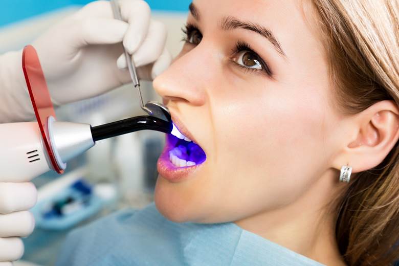 a patient receiving a tooth-colored filling in Corte Madera