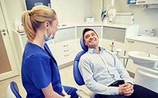 man at a teeth whitening consultation with his cosmetic dentist in Corte Madera