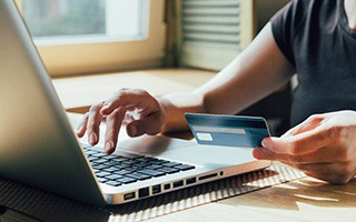 Woman using credit card